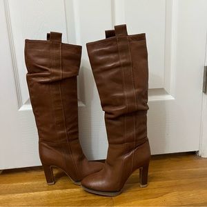 Brown heeled boots by EXE are in excellent condition. Size 6 1/2